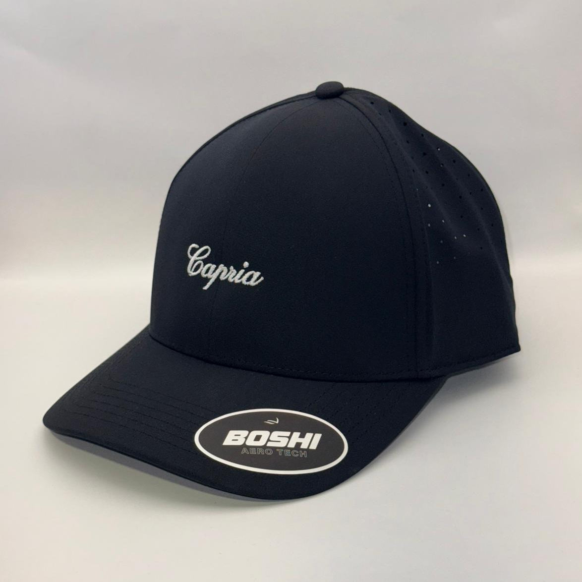 Black cap with 'Capria' and 'Boshi' branding on a white background